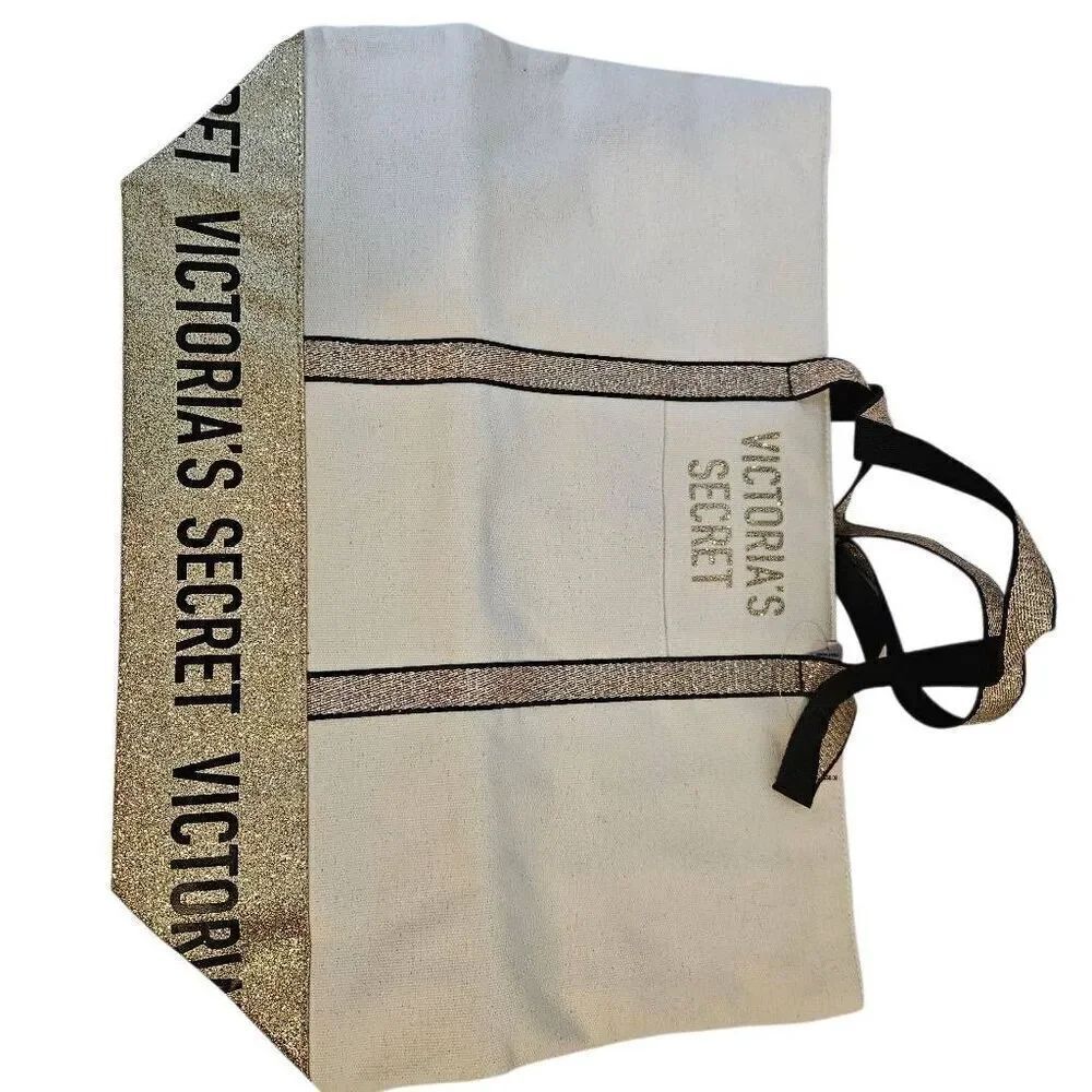 Victoria's Secret tote, cream with gold accents.